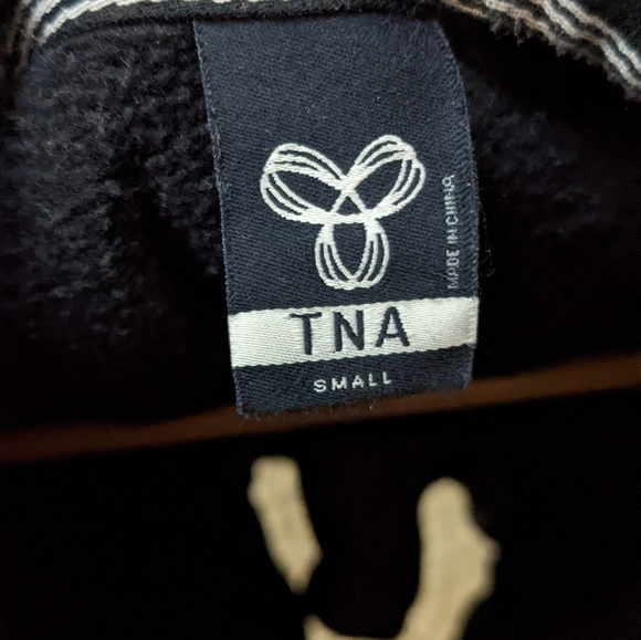 TNA hoodie, black with pink logo, size small - Picture 3 of 3
